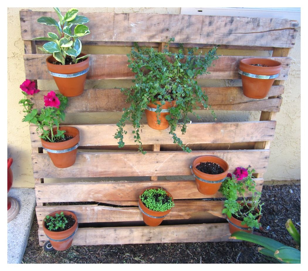 25 Amazing DIY Projects to Repurpose Pallets into Garden Planters --> Pallet Flower Pot Planter