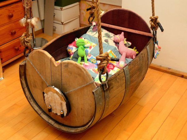 36+ Creative DIY Ideas to Upcycle Old Wine Barrels --> Baby Cradle Made from Old Wine Barrel