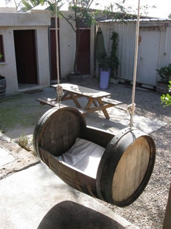 36+ Creative DIY Ideas to Upcycle Old Wine Barrels --> Wine Barrel Swing