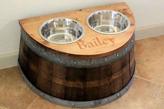 36+ Creative DIY Ideas to Upcycle Old Wine Barrels --> Recycled Wine Barrel Dog Feeder