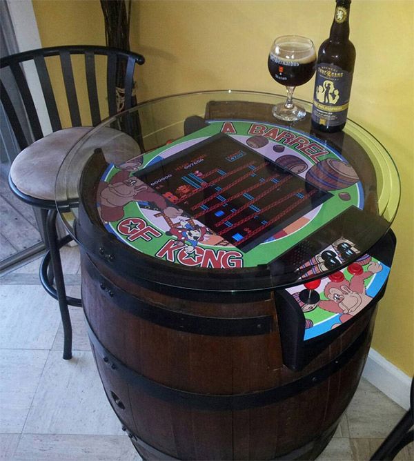 36+ Creative DIY Ideas to Upcycle Old Wine Barrels --> DIY Donkey Kong Game Table from Wine Barrel
