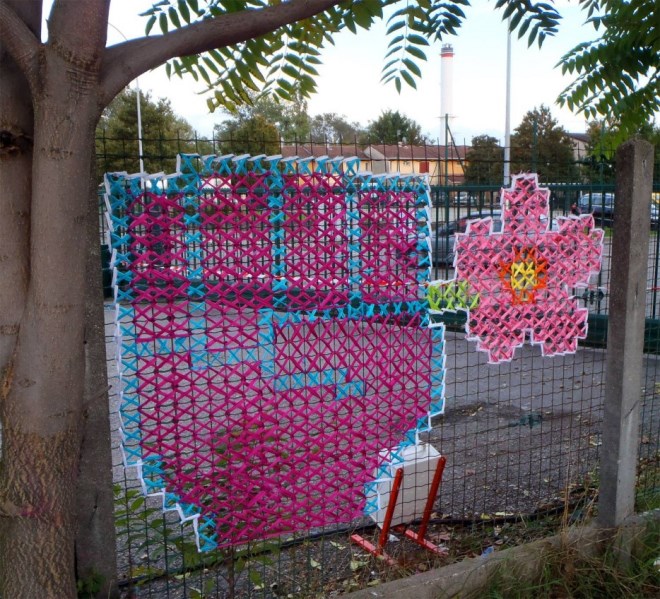 Creative-Street-Art-Cross-Stitch-Murals-on-Fences-8.jpg