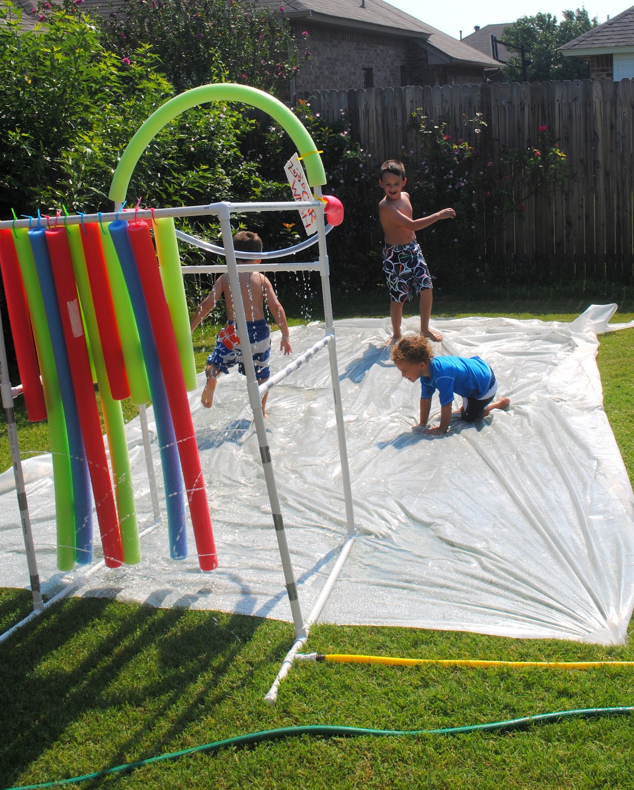 35+ Fun Activities for Kids to Do This Summer --> DIY Slip N Slide