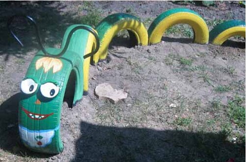 40+ Creative DIY Ideas to Repurpose Old Tire into Animal Shaped Garden Decor --> Tire Dragon