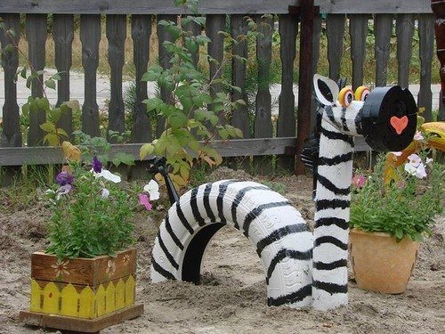 40+ Creative DIY Ideas to Repurpose Old Tire into Animal Shaped Garden Decor --> Tire Zebra