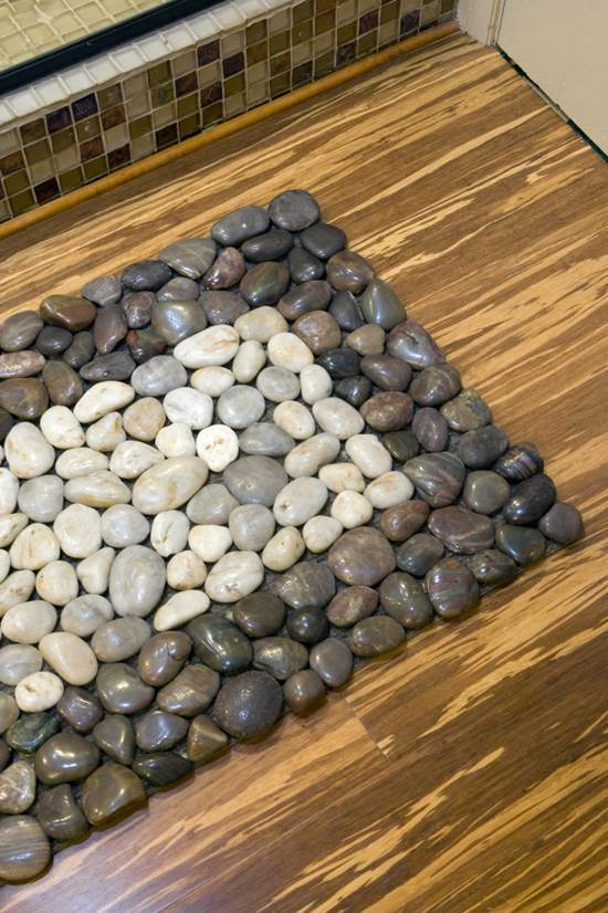 How to DIY Stone Floor Mat --> Pebbles transform a simple doormat