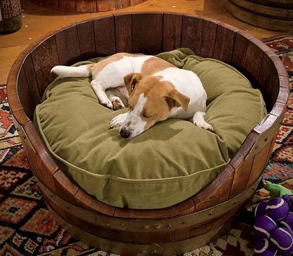 36+ Creative DIY Ideas to Upcycle Old Wine Barrels --> Wine Barrel Pet Bed