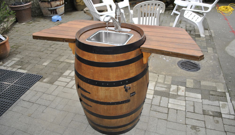 36+ Creative DIY Ideas to Upcycle Old Wine Barrels --> DIY Wine Barrel Sink