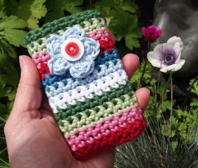 30 Stylish DIY Crochet Phone Cases --> Garden Flower Crocheted Mobile Phone Pocket