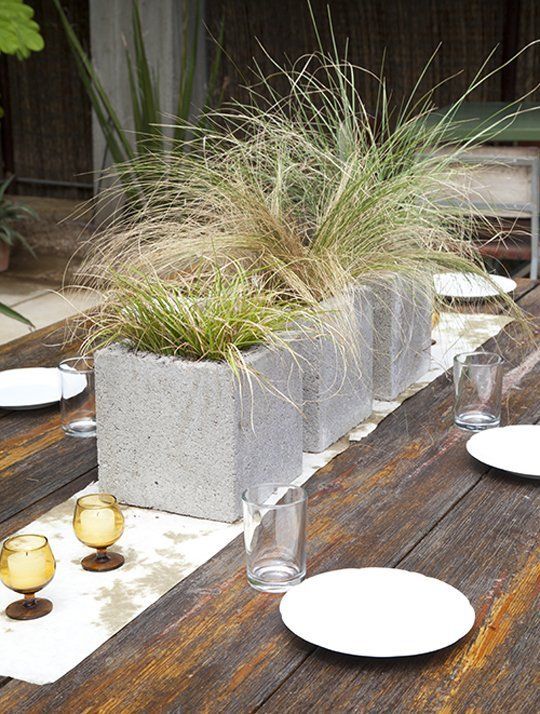 20+ Creative Uses of Concrete Blocks in Your Home and Garden --> Modern Grassy Centerpieces in Cinder Blocks