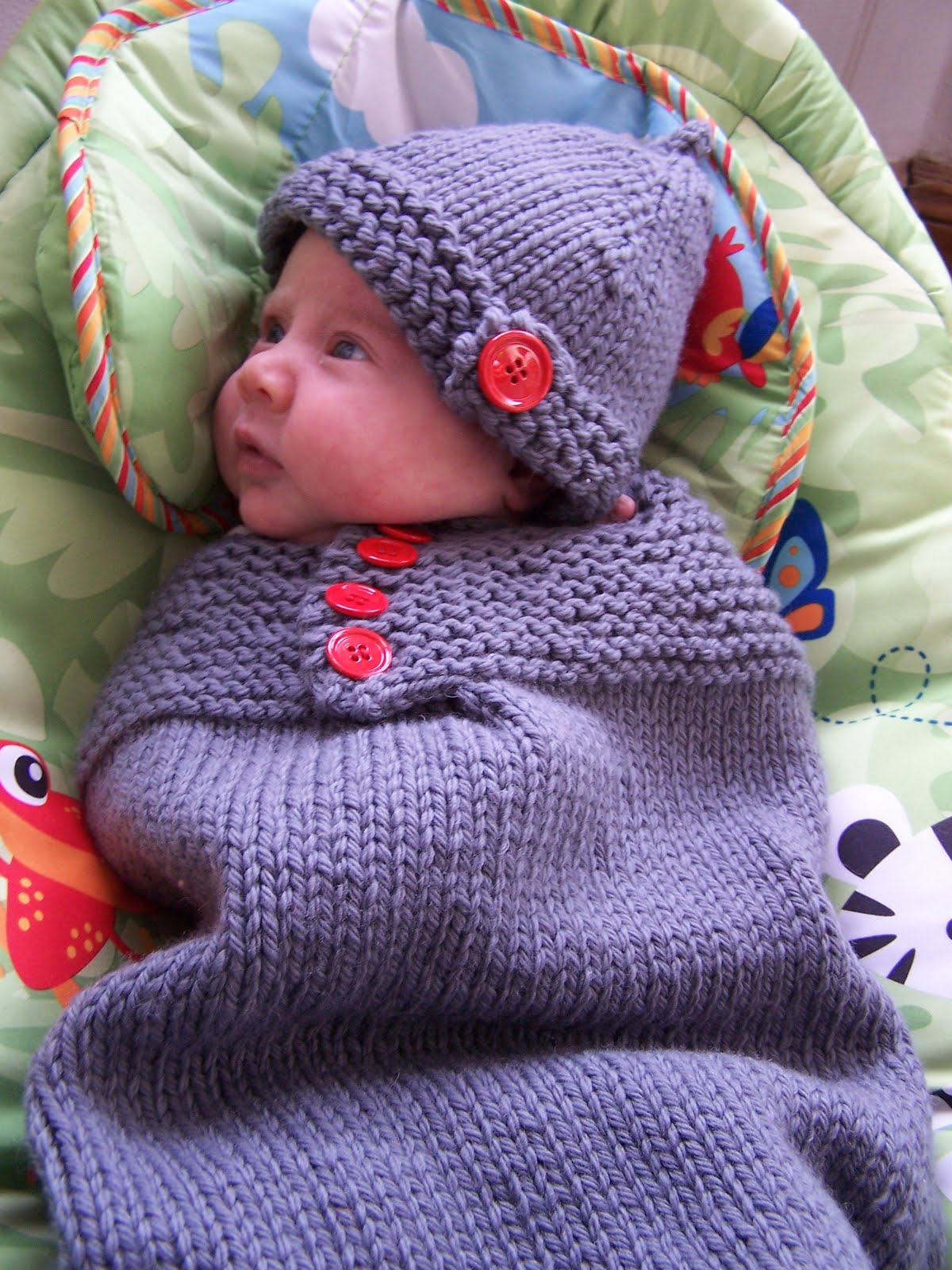 35+ Adorable Crochet and Knitted Baby Cocoon Patterns --> Knitted Snuggle