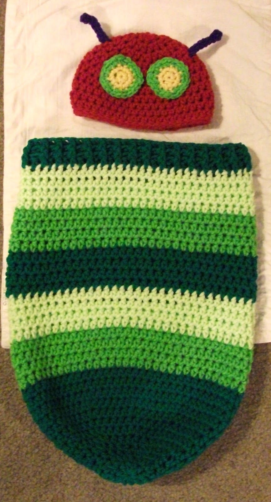 35+ Adorable Crochet and Knitted Baby Cocoon Patterns --> The Very Hungry Caterpillar Crochet Baby Hat and Cocoon