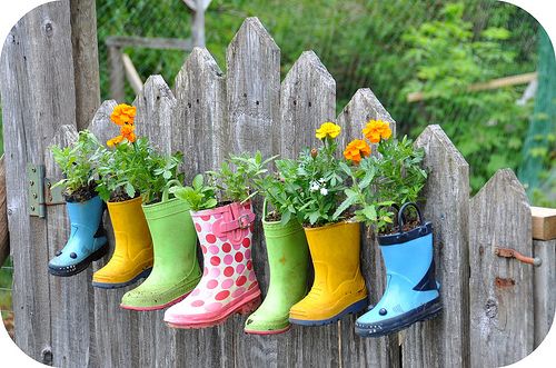 40+ Creative DIY Garden Containers and Planters from Recycled Materials --> Rain Boots Flower Planters