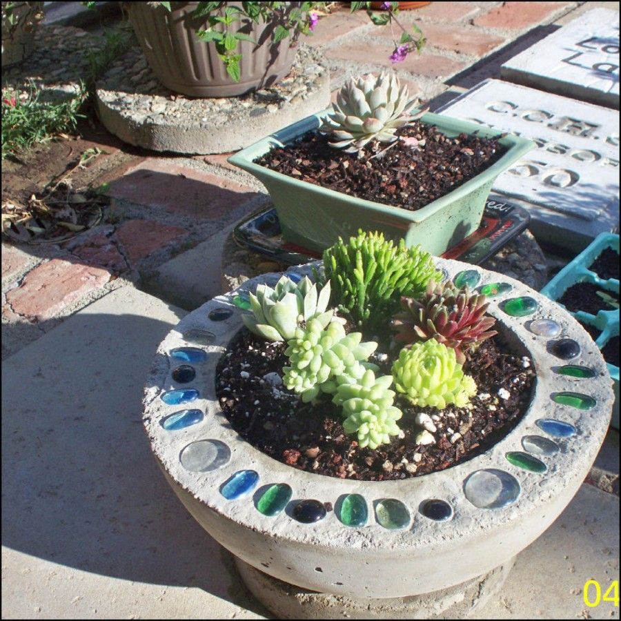40+ Creative DIY Garden Containers and Planters from Recycled Materials --> DIY Bowling Ball Planter