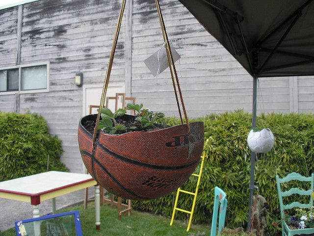 40+ Creative DIY Garden Containers and Planters from Recycled Materials --> Basketball Hanging Planter