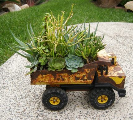 40+ Creative DIY Garden Containers and Planters from Recycled Materials --> Toy Truck Planters