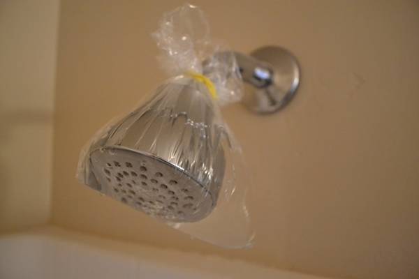 20+ Cleaning Hacks for The Hard To Clean Items In Your Home --> How to Clean a Shower Head