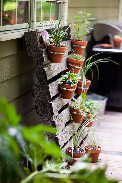 20+ Creative DIY Vertical Gardens For Your Home --> DIY Pallet Planter