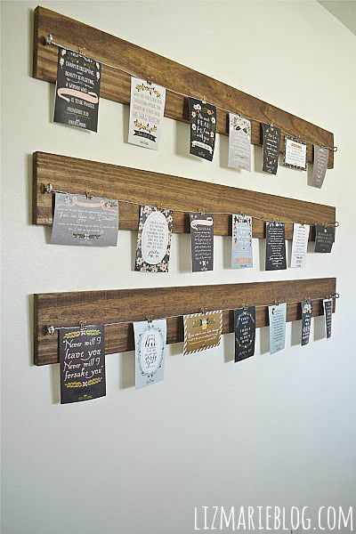 35+ Creative DIY Ways to Display Your Family Photos --> DIY Wood and Wire Photo Display