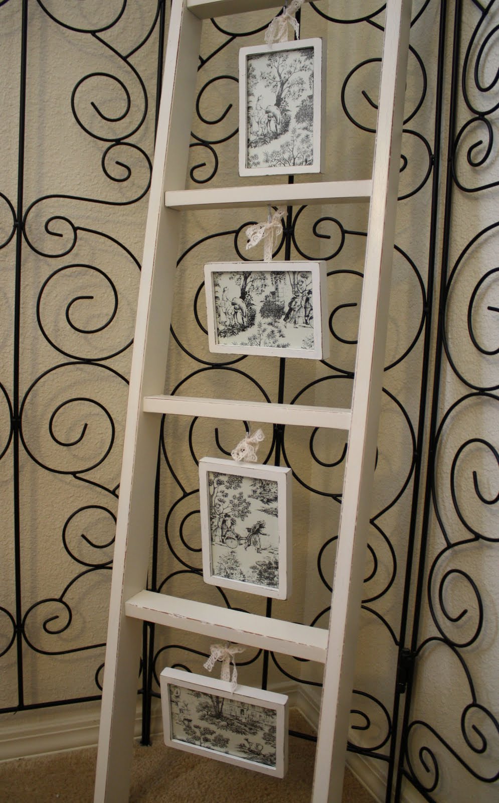 35+ Creative DIY Ways to Display Your Family Photos --> Ladder Photo Gallery
