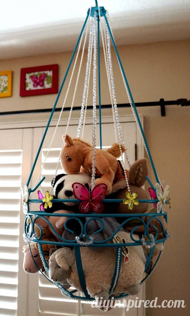 20+ Creative DIY Ways to Organize and Store Stuffed Animal Toys --> DIY Stuffed Animal Toy Storage From Old Plant Hanger