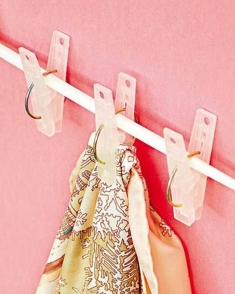 20+ Creative Uses of Tension Rods to Organize Your Home --> Use Tension Rod and Clips to Hang Scarves