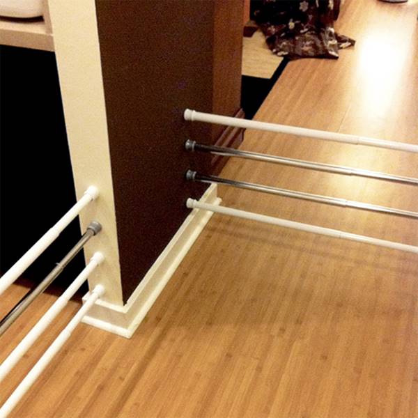 20+ Creative Uses of Tension Rods to Organize Your Home --> Stack tension rods in the hallway as gates to keep pets or infants out of the areas where they are not supposed to go in