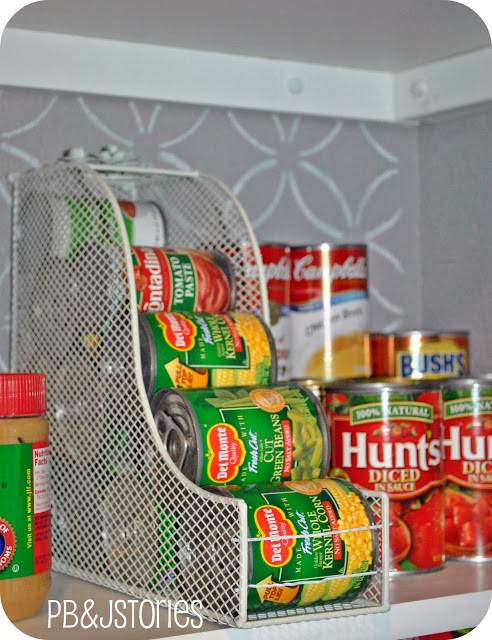 20+ Creative Uses for Magazine Holders to Organize Your Home --> Use a magazine holder to organize food cans in the pantry