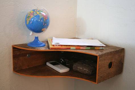 20+ Creative Uses for Magazine Holders to Organize Your Home --> Upcycle a wooden magazine holder into a catch-all shelf mounted on the wall