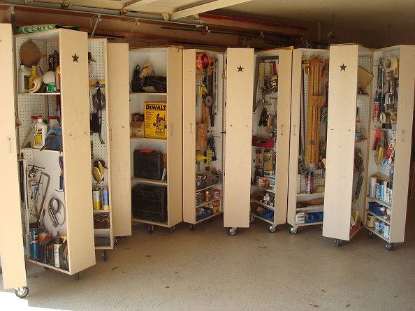 30+ Creative Ways to Organize Your Garage --> Hide all of the clutter and organize your tools with cabinets on wheels in the garage