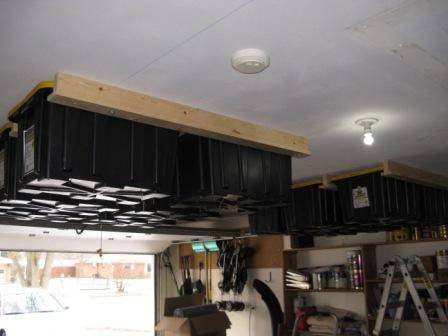 30+ Creative Ways to Organize Your Garage --> Install overhead storage for lighter items
