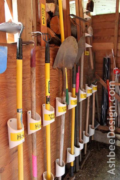 30+ Creative Ways to Organize Your Garage --> Use PVC pipe to build a garden tool organizer