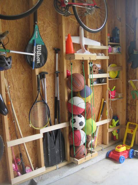 30+ Creative Ways to Organize Your Garage --> Keep sports balls easily organized with bungee cords and save space