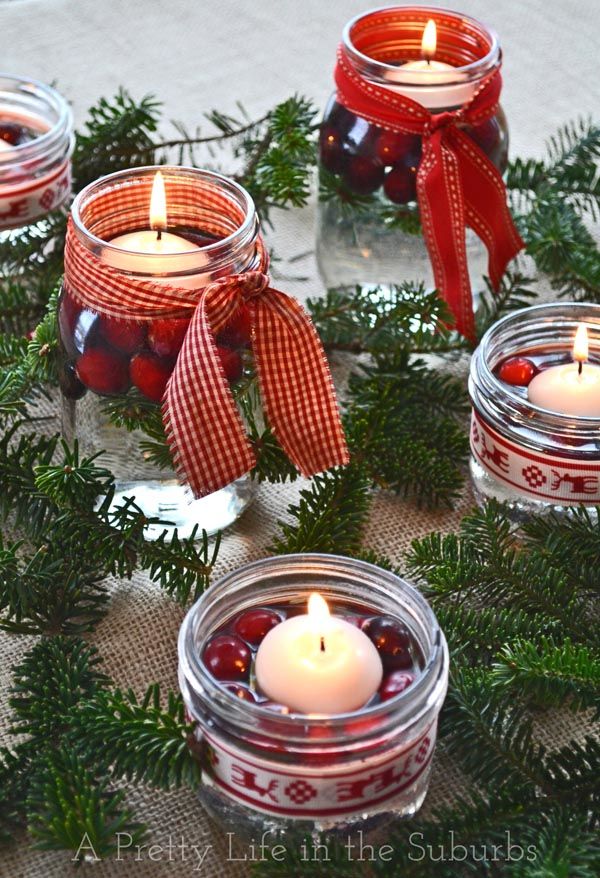 40+ Creative DIY Holiday Candles Projects --> Cranberry Floating Candle Jars