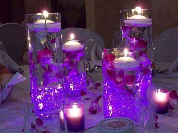 40+ Creative DIY Holiday Candles Projects --> Floating Candle Centerpiece With Flower