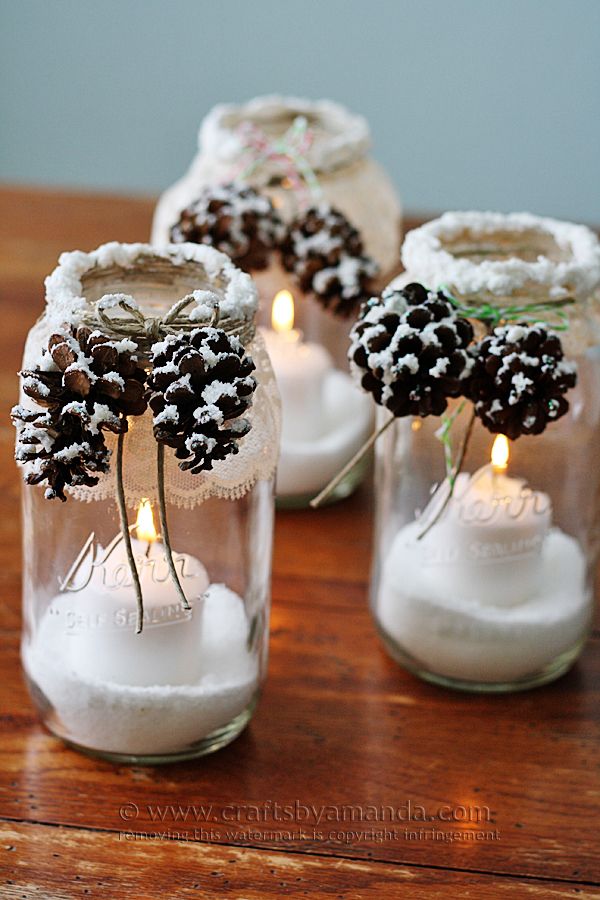 40+ Creative DIY Holiday Candles Projects --> Snowy Pinecone Candle Jars