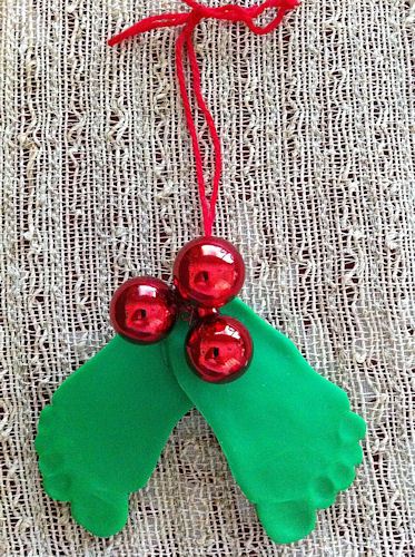 40+ Creative Handprint and Footprint Crafts for Christmas --> Christmas Baby Mistletoe and Holly Craft