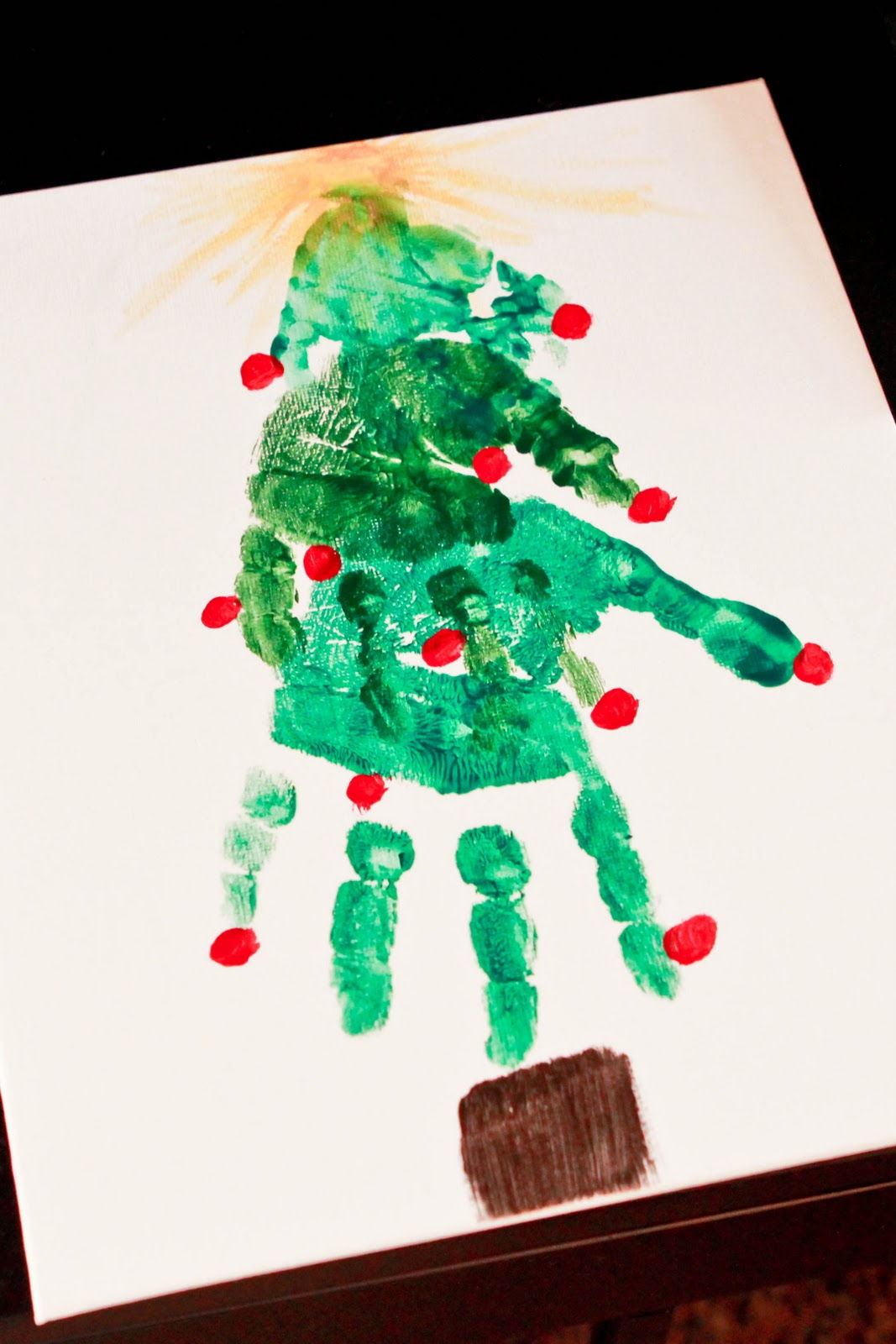 40+ Creative Handprint and Footprint Crafts for Christmas --> Handprint Christmas Tree