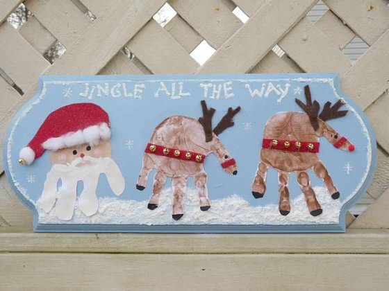 40+ Creative Handprint and Footprint Crafts for Christmas --> Santa and Reindeer Handprint Plaque