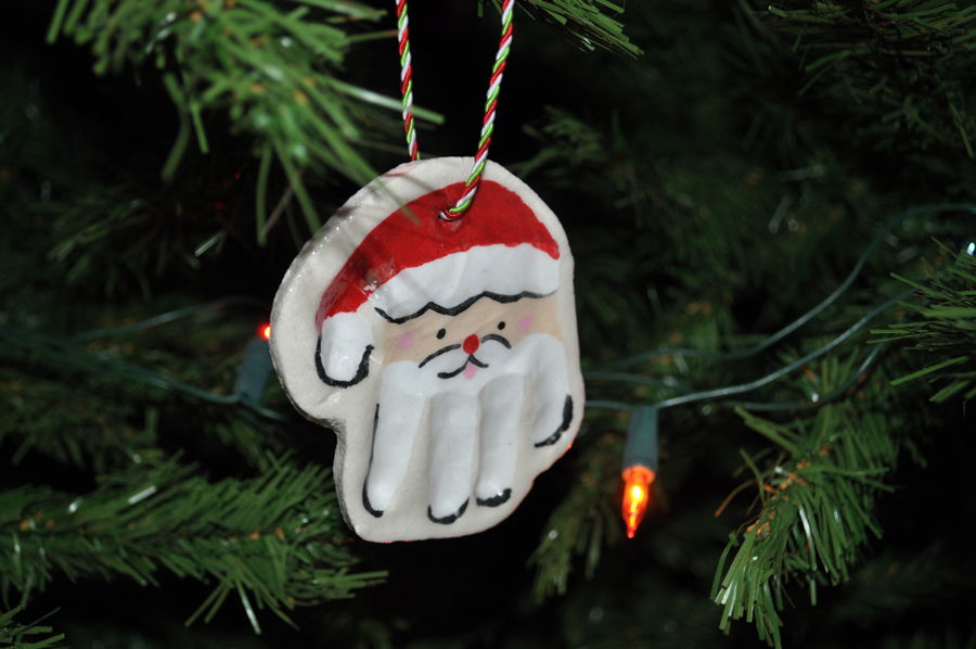 40+ Creative Handprint and Footprint Crafts for Christmas --> Hand Print Santa Ornaments