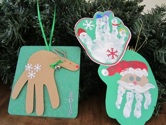 40+ Creative Handprint and Footprint Crafts for Christmas --> Hand Print Christmas Ornaments