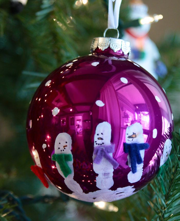 40+ Creative Handprint and Footprint Crafts for Christmas --> Handprint Snowman Glass Ball Ornaments