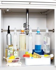 40+ Organization and Storage Hacks for Small Kitchens --> Organize spray bottles under the sink with a tension rod
