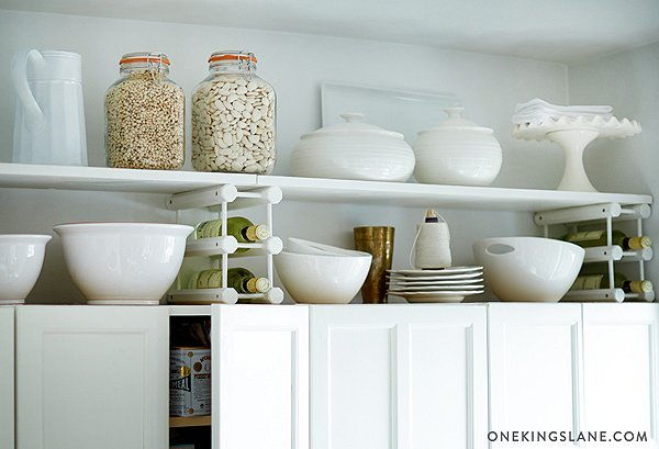 40+ Organization and Storage Hacks for Small Kitchens --> Add a simple wooden shelf on top of the existing cabinets