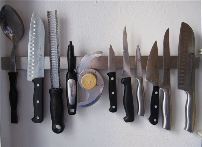 40+ Organization and Storage Hacks for Small Kitchens --> Free up some counter and drawer space with a magnetic knife strip