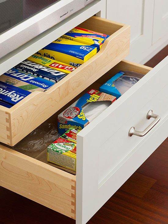 40+ Organization and Storage Hacks for Small Kitchens --> Divide the space of a deep drawer with a sliding insert