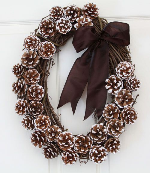 40+ Creative Pinecone Crafts for Your Holiday Decorations --> Frost-tipped Pinecones Wreath to Decorate Your Front Door