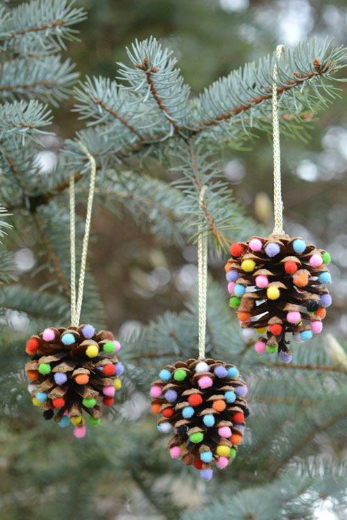 40+ Creative Pinecone Crafts for Your Holiday Decorations --> Pom Poms and Pinecones Christmas Ornaments