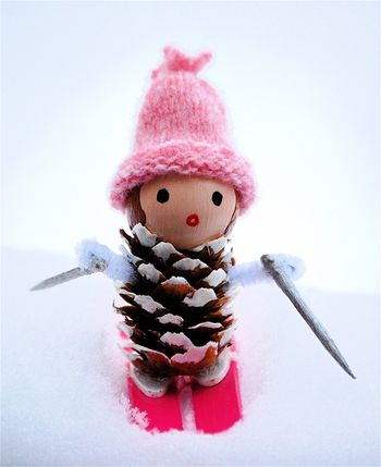 40+ Creative Pinecone Crafts for Your Holiday Decorations --> Little Miss Pine Cones Go Skiing