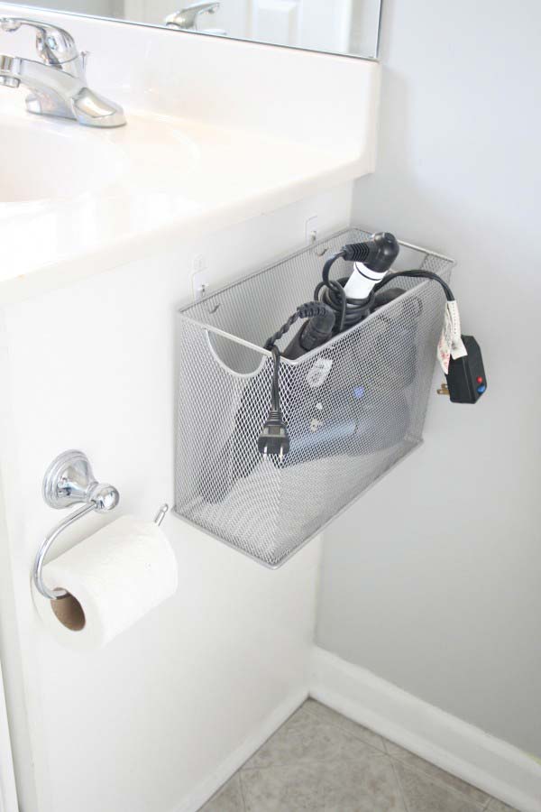 40+ Brilliant DIY Storage and Organization Hacks for Small Bathrooms --> DIY file box bathroom appliance storage
